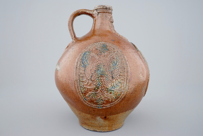 A rare Frechen bellarmine jug with double eagle seals, dated 1604
