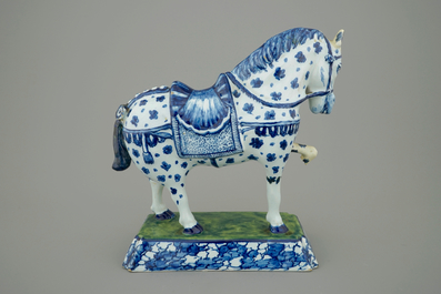 A blue and white Dutch Delft figure of a horse, 18th C.