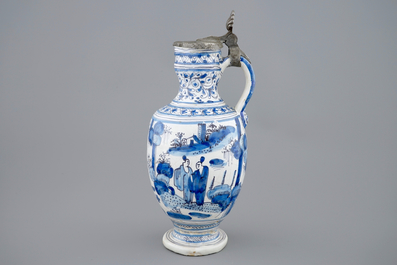 A blue and white chinoiserie jug with pewter lid, Haarlem, first half 17th C.