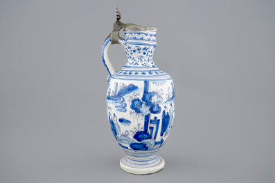 A blue and white chinoiserie jug with pewter lid, Haarlem, first half 17th C.