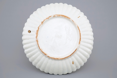 A Dutch Delft notched plate in cashmere palette, 18th C.