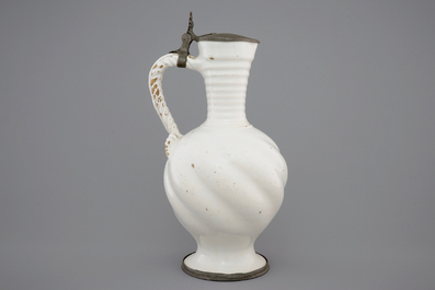 A large white Delft pewter-mounted jug with rope twist handle, 17th C.