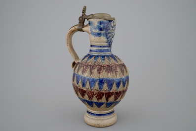 A Westerwald pewter-mounted jug, 17th C.