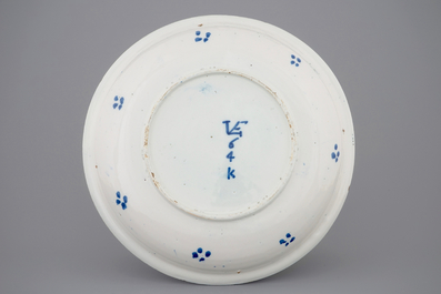 A blue and white Dutch Delft dish with millefiori design, late 17th C.