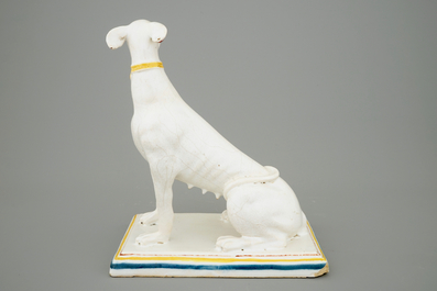 A tall polychrome Brussels faience model of a sighthound, 18th C.