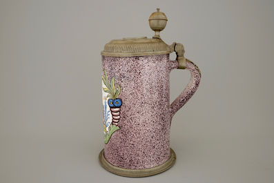 A German faience pewter-mounted beer stein with a sheep, 18th C.
