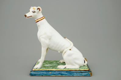 A tall polychrome Brussels faience model of a sighthound, 18th C.