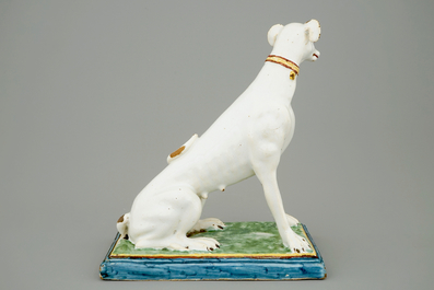 A tall polychrome Brussels faience model of a sighthound, 18th C.