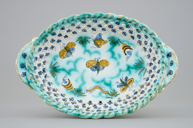 A Brussels faience basket with butterflies and caterpillars, 18th C.