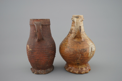 Two early saltglazed stoneware jugs, Raeren, 15/16th C.