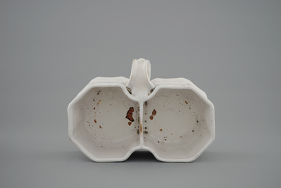 A white Delft cruet set, 18th C.