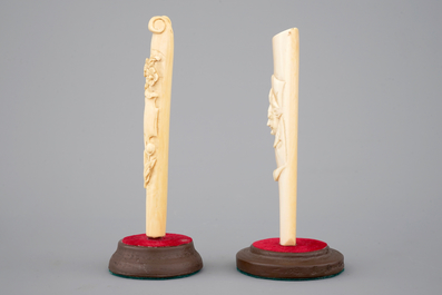 Two carved ivory umbrella or parasol handles, Dieppe (?), 19th C.