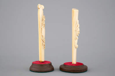 Two carved ivory umbrella or parasol handles, Dieppe (?), 19th C.