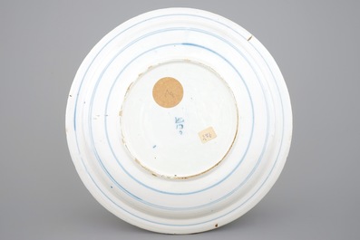 A large blue and white Dutch Delft chinoiserie dish, ca. 1700