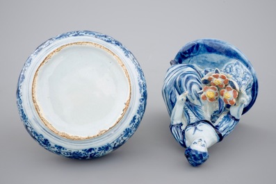 A polychrome Dutch Delft butter tub with a seated lady, 18th C.