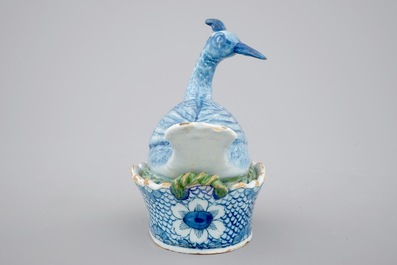 A Dutch Delft polychrome bird-form butter tub, 18th C.