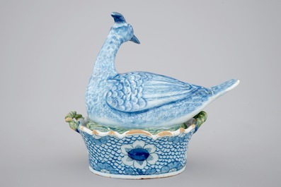 A Dutch Delft polychrome bird-form butter tub, 18th C.