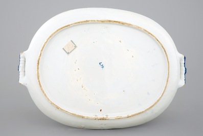An oval blue and white Dutch Delft serving tray with a biblical scene, 18th C.