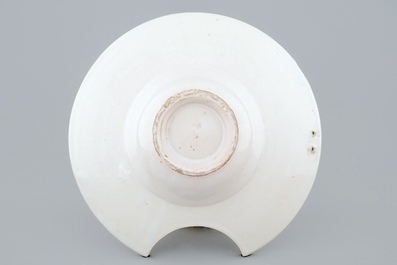 A white Dutch Delft shaving bowl, late 18th C.