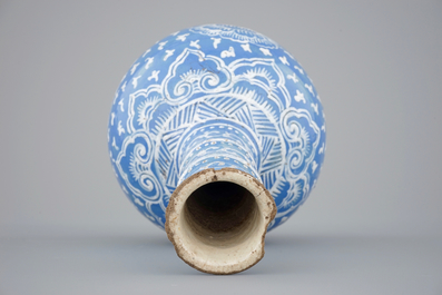 A bottle-shaped Persian style blue ground vase, poss. France, 18/19th C.