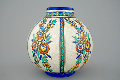 A Charles Catteau crackle glazed vase with floral decoration for Boch K&eacute;ramis, 1st half 20th C.