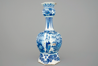 A tall blue and white Dutch Delft garlic neck vase with chinoiserie decoration, ca. 1700