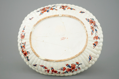 A fluted oval Dutch Delft dish in cashmere palette, ca. 1700