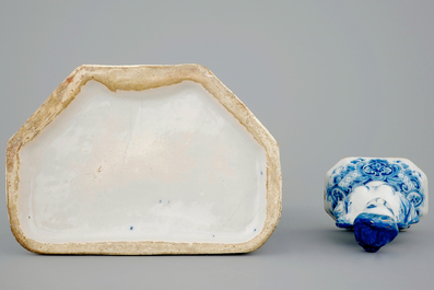 A Dutch Delft blue and white wall cistern with basin, 18th C.