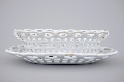 A white monochrome Brussels faience open-worked basket on stand, 18th C.