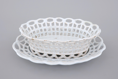 A white monochrome Brussels faience open-worked basket on stand, 18th C.