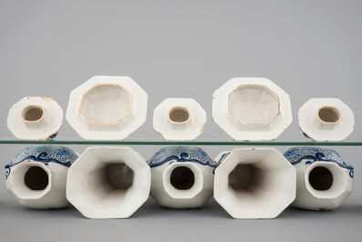 A 5-piece blue and white Dutch Delft garniture with architectural design, 18th C.