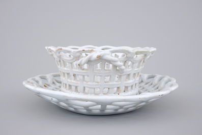 A white monochrome Brussels faience open-worked basket on stand, 18th C.