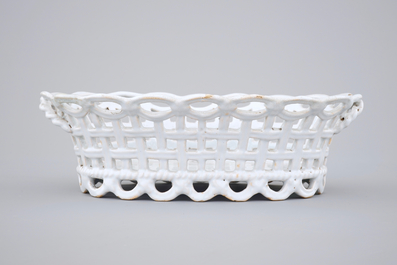 A white monochrome Brussels faience open-worked basket on stand, 18th C.