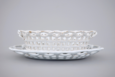 A white monochrome Brussels faience open-worked basket on stand, 18th C.