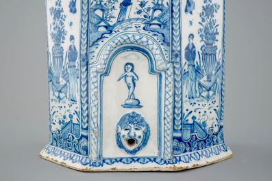 A Dutch Delft blue and white wall cistern with basin, 18th C.