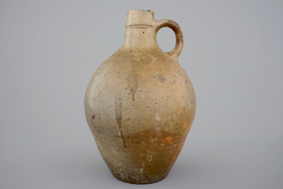 A tall stoneware bellarmine face jug, 17/18th C.