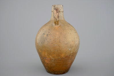 A tall stoneware bellarmine face jug, 17/18th C.