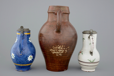 A pewter-mounted Brussels faience jug, a large Raeren jug and a Northern-French jug, 18/19th C.