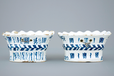 A pair of blue and white bouquetieres or wall flower holders, Lille, 18th C.