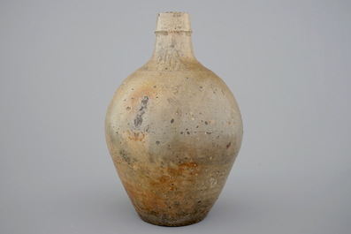 A tall stoneware bellarmine face jug, 17/18th C.