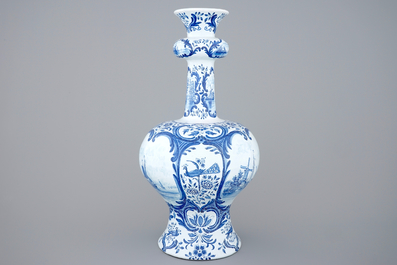 A very tall blue and white Dutch Delft garlic neck vase, Makkum, 19th C.