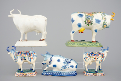 A collection of Dutch Delftware: a monochrome white dish, a cardinal's dish and 5 cows, 17/19th C.