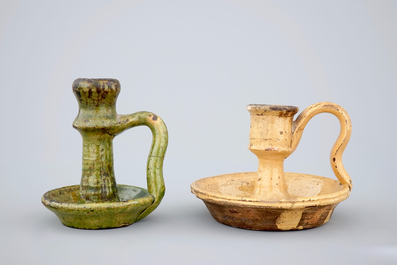 Two medieval tiles and two late medieval candlesticks, 16/17th C.