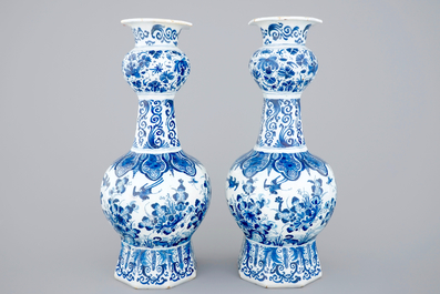 A pair of blue and white Dutch Delft vases with peacocks, ca. 1700