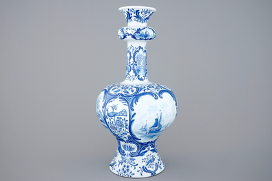 A very tall blue and white Dutch Delft garlic neck vase, Makkum, 19th C.