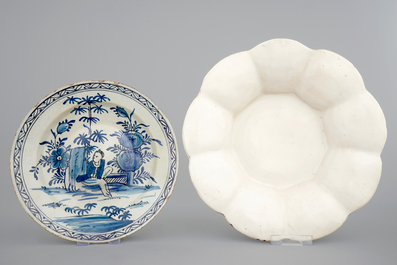 A collection of Dutch Delftware: a monochrome white dish, a cardinal's dish and 5 cows, 17/19th C.