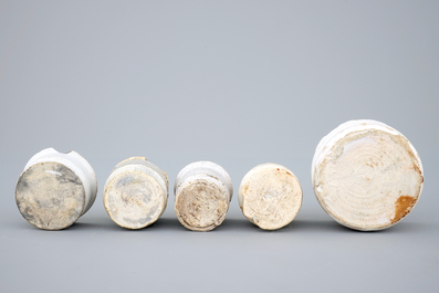 A set of five monochrome white Dutch Delft ointment jars, 17th C.