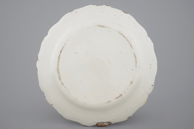 A large white monochrome Delftware dish with lobed edge, 18th C.