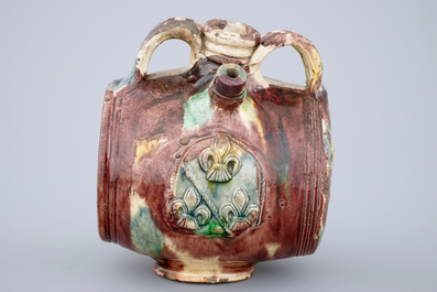 A polychrome glazed pottery barrel-shaped jug, Saintonge, France, 17th C.