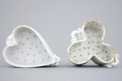 Two white Dutch Delft strainers, heart-shaped and trilobed, 18th C.